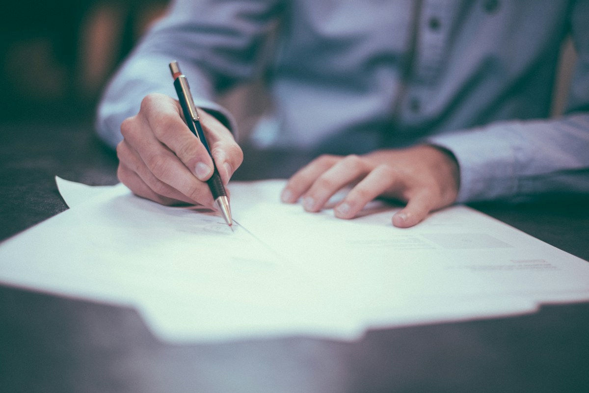 Reviewing written documentation at a desk